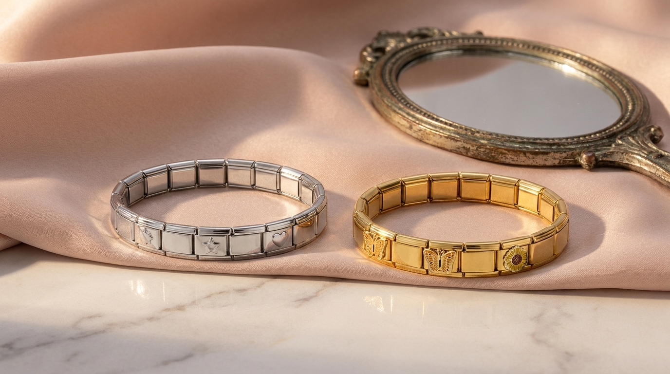 Two assembled Italian charm bracelets side by side, silver on the left and gold on the right, showing the two-tone mixed-metal look for 2026